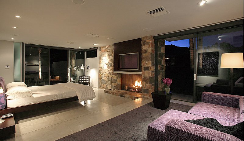 master bedroom includes fireplace course views Luksuzan dom Leonarda DiKaprija