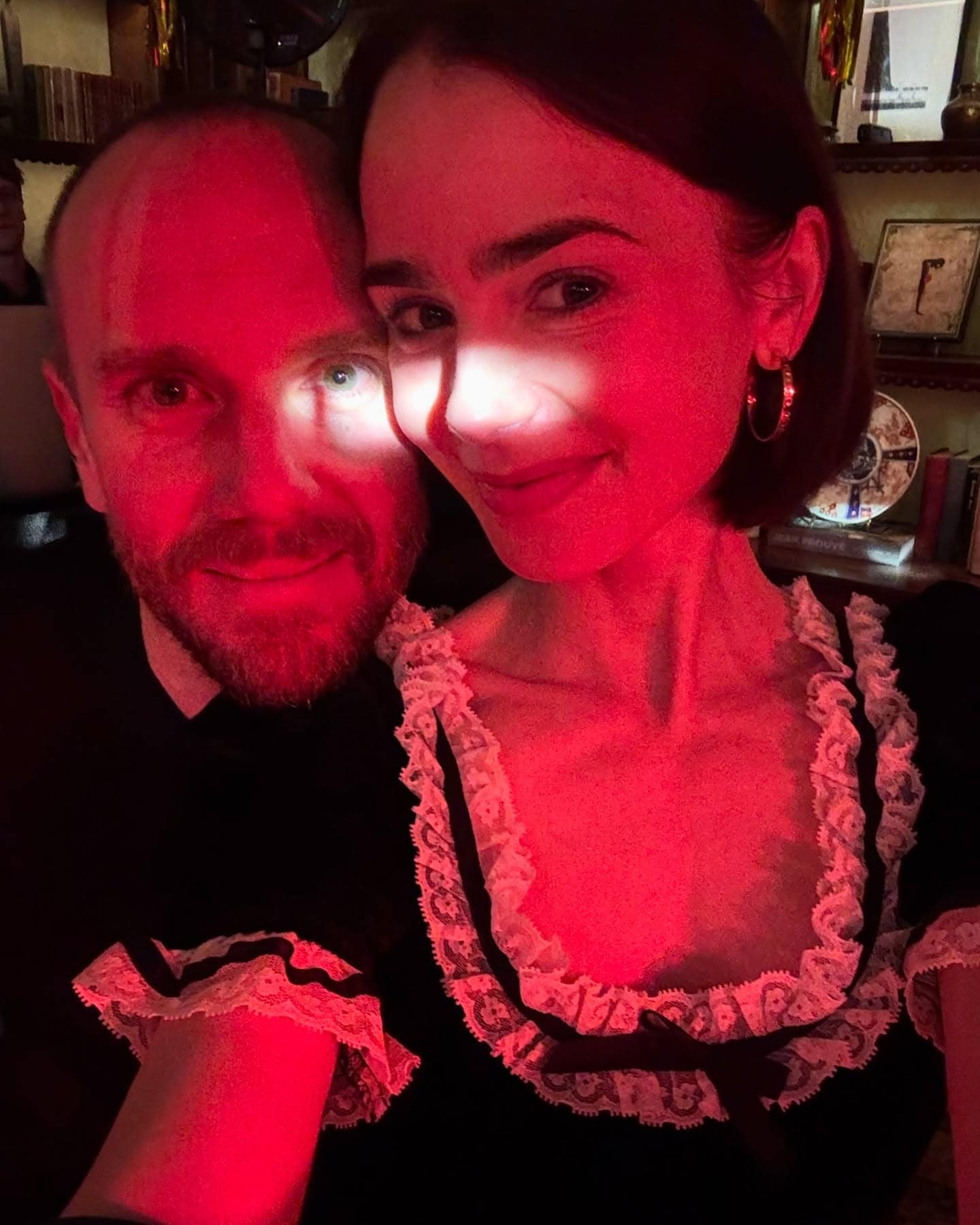 Photo by Lily Collins on December 31 2024. Можда је селфи на ком је 1 особа дирндл сукња костим и текст. min Ovako su poznate ličnosti proslavile doček Nove 2025. godine, a mi vam donosimo sve detalje